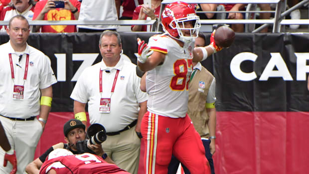 Sep 11, 2022; Glendale, Arizona, USA; Kansas City Chiefs tight end Travis Kelce (87) celebrates after scoring a touchdown in the first half against the Arizona Cardinals at State Farm Stadium. Mandatory Credit: Matt Kartozian-USA TODAY Sports